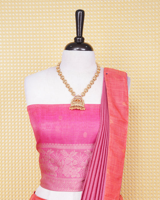 Burnt orange & magenta pink colour Linen Silk Semi stitched dhavani set featuring buttas, zari bordered skirt & blouse piece and dupatta.