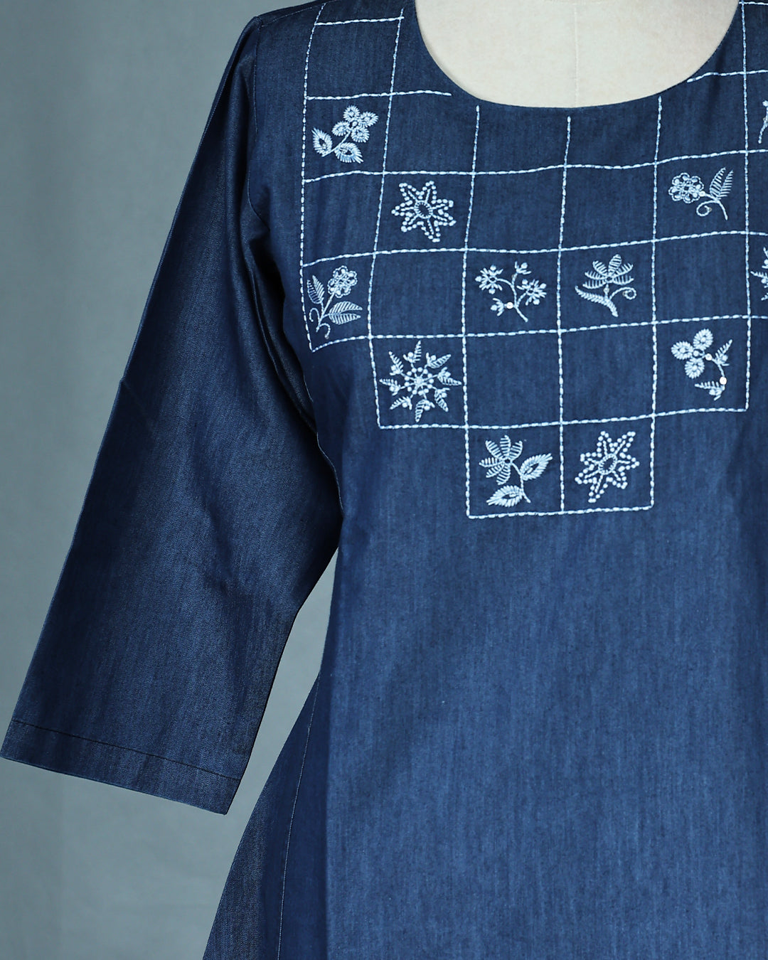 Blue Denim Design Colour Kurti featuring Thread Box with Floral motifs Work On body , a U neckline, With sleeve.