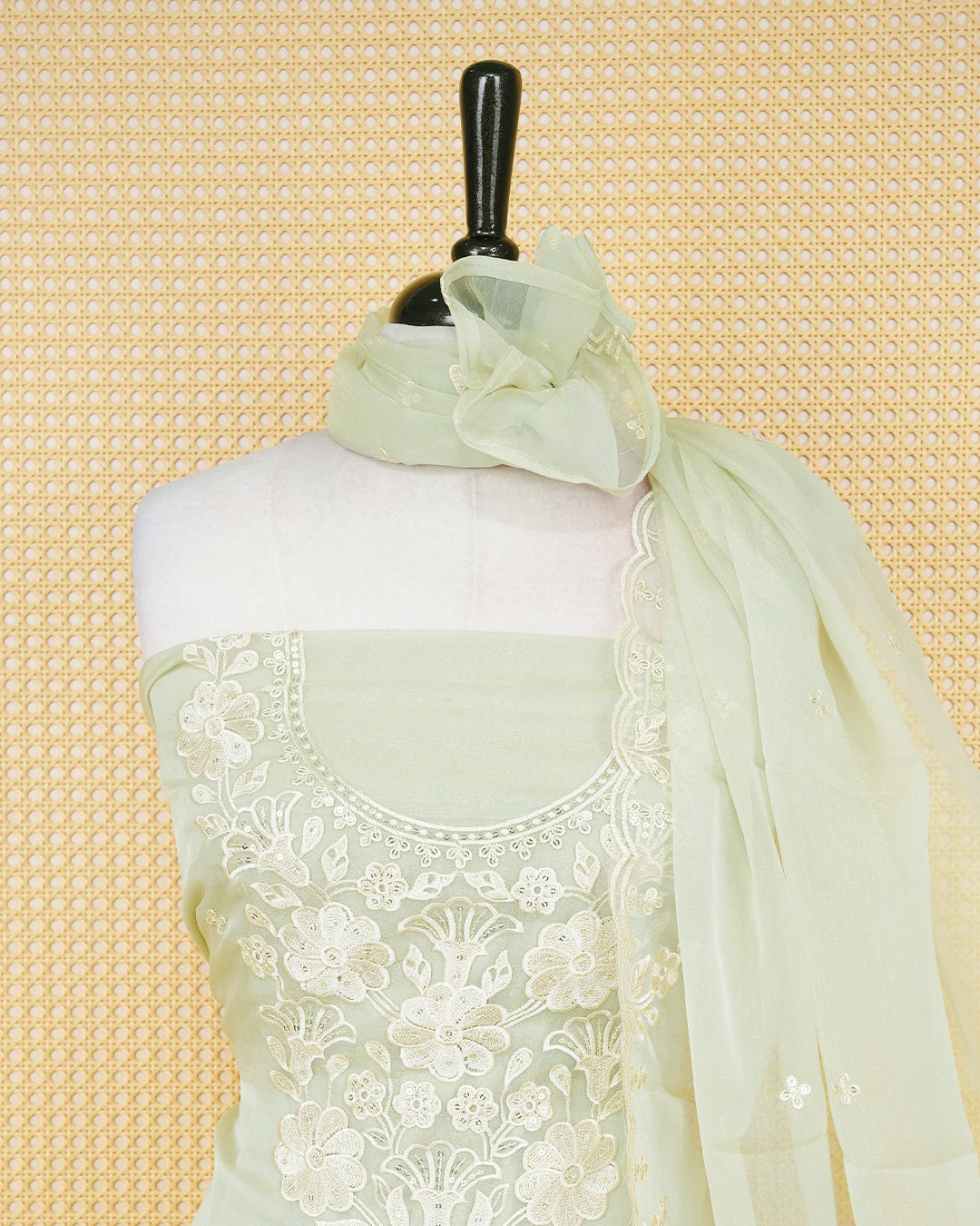 Pastal Green Georgette Salwar Material Features an Inrcate Floral Emproidary Pattern Aborned With Shimmering Sequin Accents, paired with matching bottom & elegant Duptta