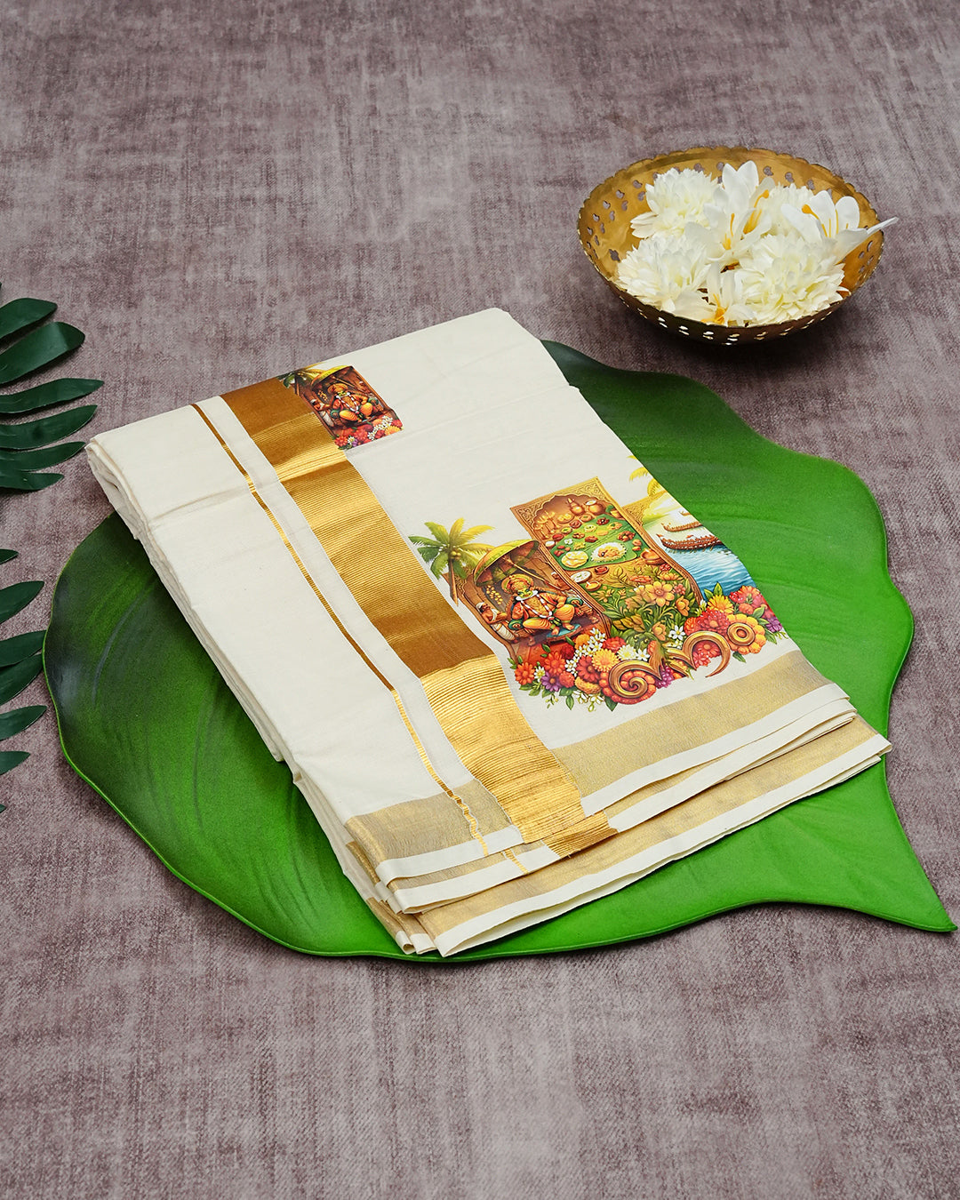 Cream Coloured Cotton Double Dhoti Finished with Onam Themed Prints & Gold Kara