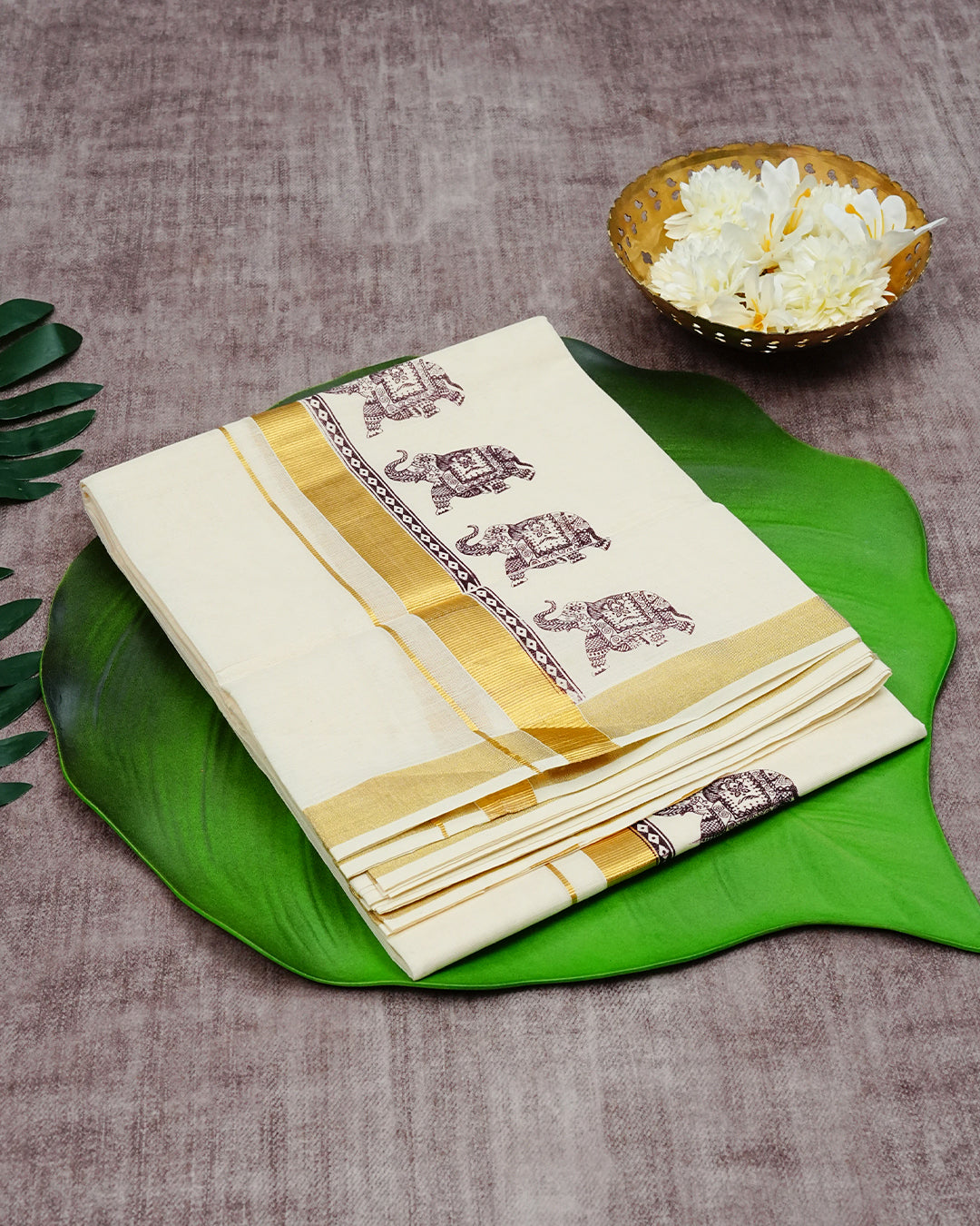 Cream Coloured Cotton Double Dhoti Finished with Brown Colour Elephant Printed &  Gold Kara
