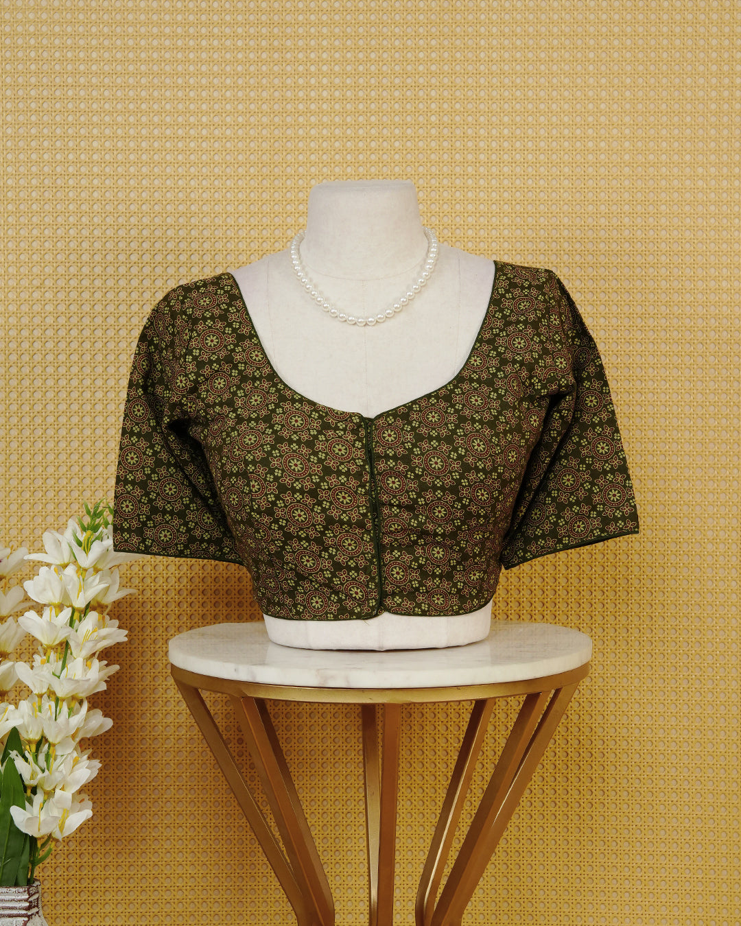 Olive Colour Blouse Featuring A Classic U-Neck, Intricate Floral Geometric Print, And Comfortable Elbow Length Sleeves.