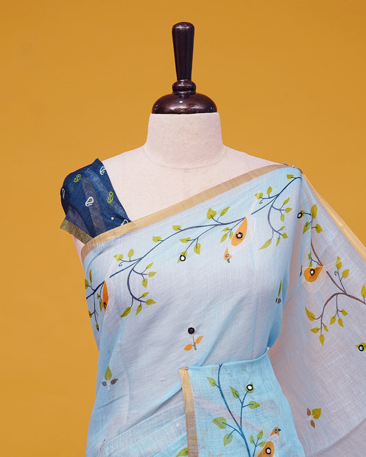 Light Blue Colour Semi Linen Saree featuring birds print with mirror work, paired with matching printed blouse piece.