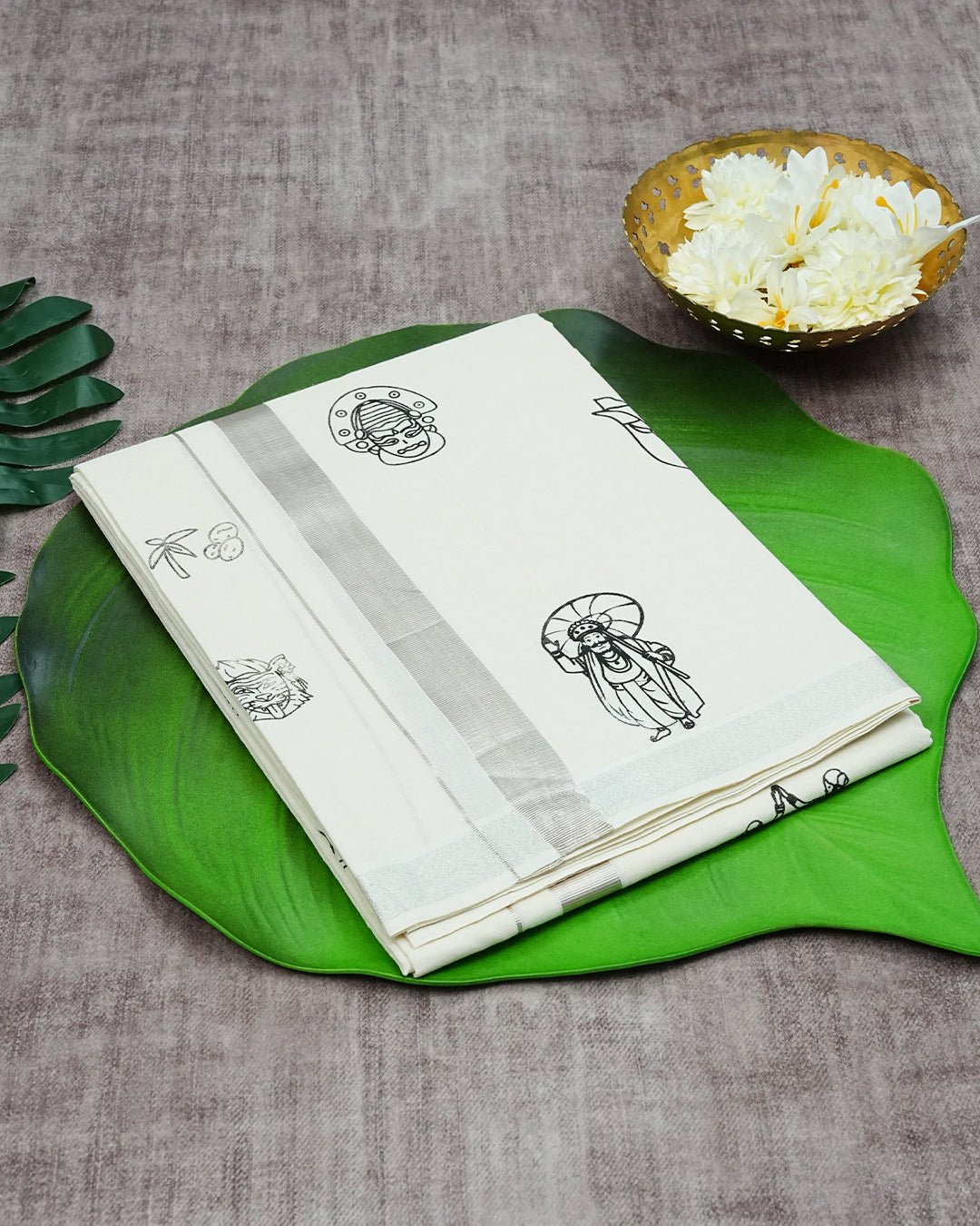Cream Coloured Cotton Double Dhoti Finished with Onam Themed Prints & Rose Gold Kara