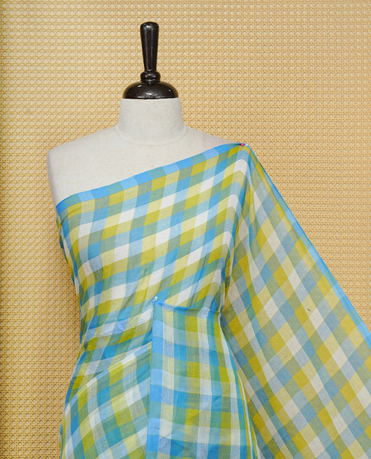 Green, Blue & white Mul cotton saree featuring Small Check pattern across body, complemented by Elegant Tassels.
