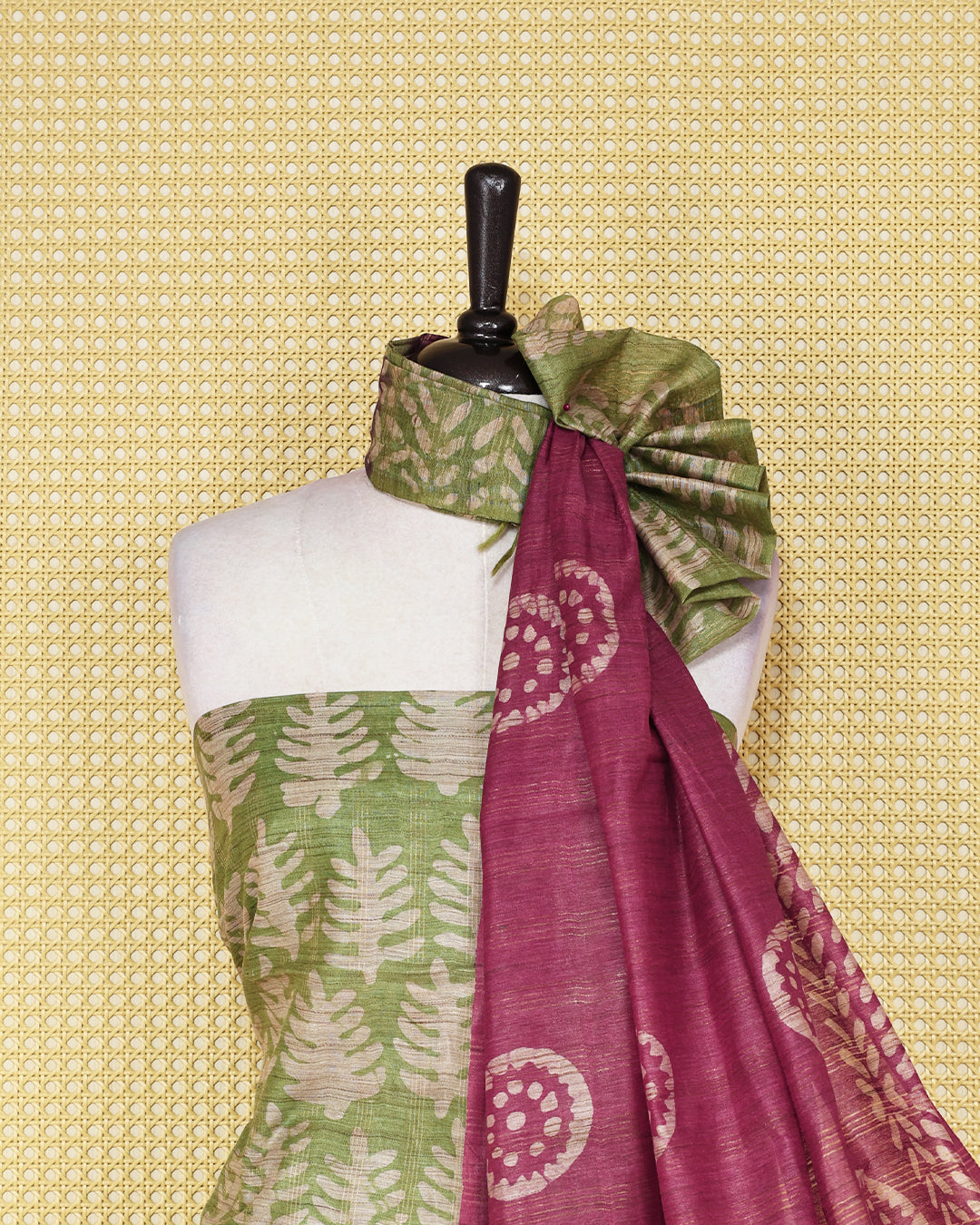 Green colour chanderi Salwar Material featuring leaf prints on the kurta, paired with a contrasting plum purple bottom and a matching printed dupatta.