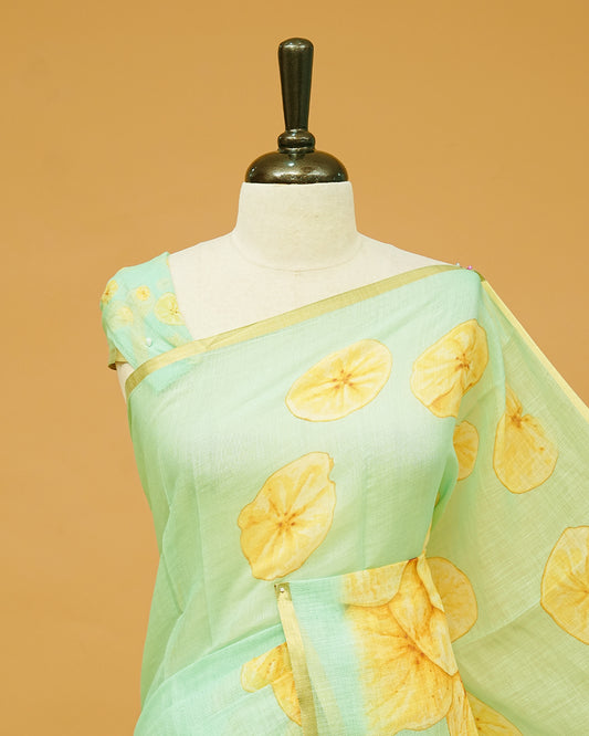 Aqua Green Colour Semi Linen Saree featuring Chips prints, paired with matching printed blouse piece.