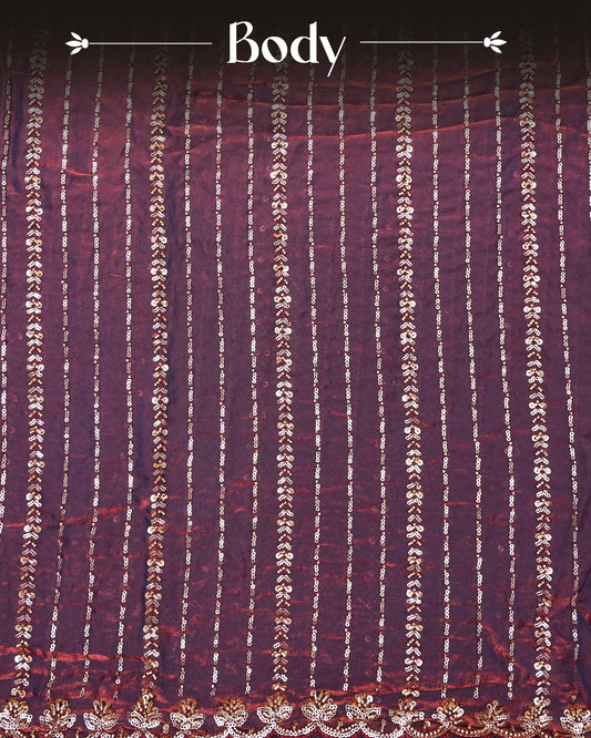 Wine colour Velvet chiffon designer saree featuring Sequins & cut beats strips on body and scallop border, comes with matching blouse piece.