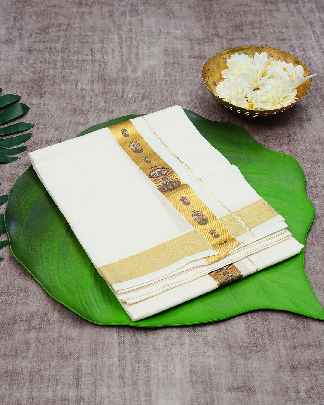 Cream Coloured Cotton Double Dhoti Finished with Traditional Arts Form Prints On Gold Kara