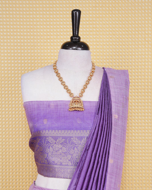 Lilac & royal purple colour Linen Silk Semi stitched dhavani set featuring buttas, zari bordered skirt & blouse piece and dupatta.