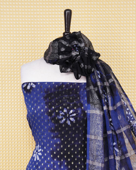 Navy Blue Georgette Salwar material Features a Vibrent Tie Dye Pattern Aborned With Shimmering Metallic Gold foil Dots,pired with matching bottom & elegant Duptta