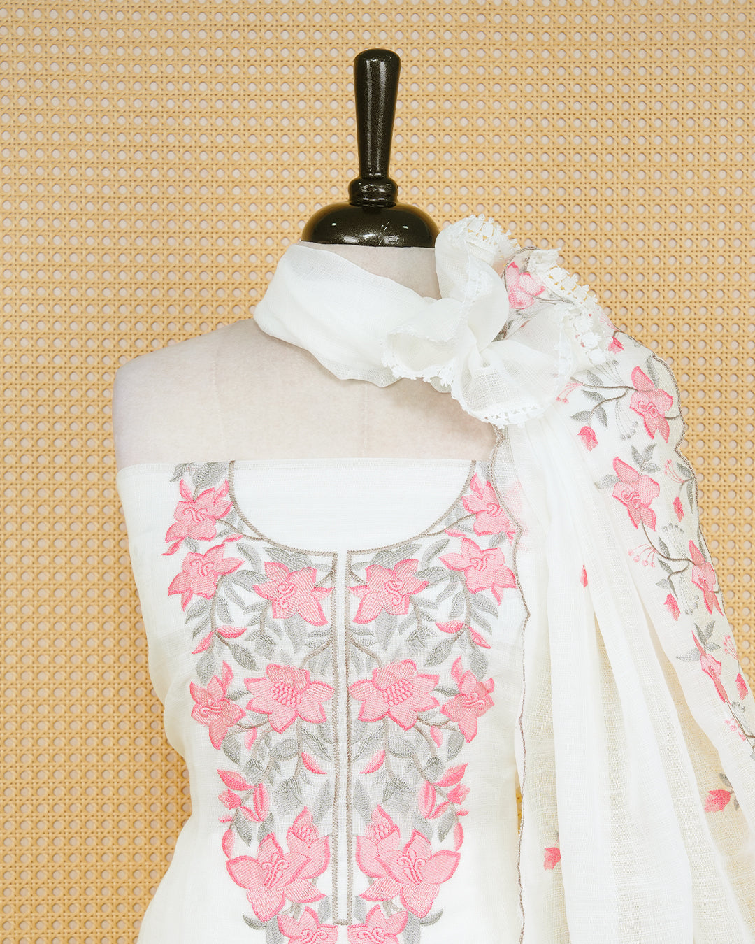 White Georgette Salwar Matierial Features an Elegant Floral Embroidary Pattern Aborned With Pink and Gray Thread Work, Pired with matching bottom & elegant Duptta