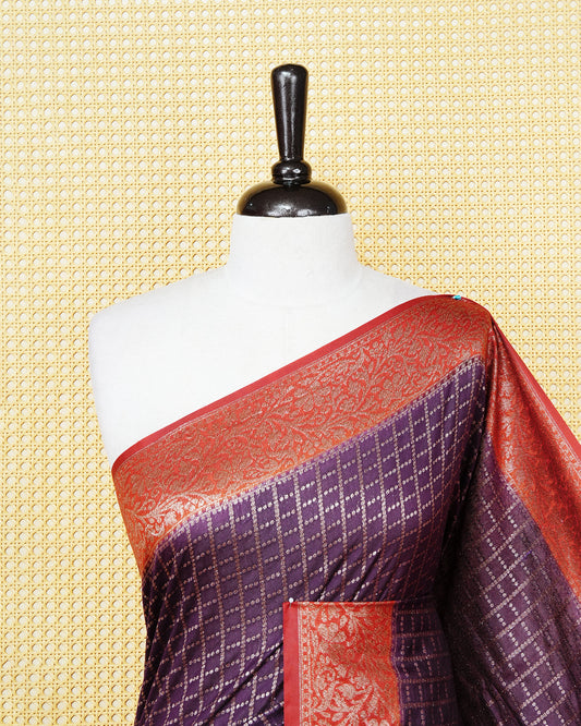 Vibrant purple Colour Semi georgette Saree having zari dotted check pattern on body, contrast Brick orange colour floral kodi designed Border, Rich Pallu comes with Matching Blouse piece.