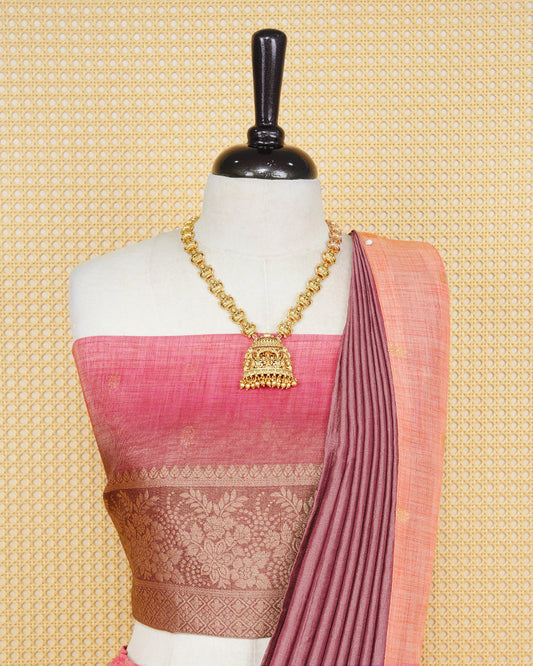 Peach & dusty maroon colour Linen Silk Semi stitched dhavani set featuring buttas, zari bordered skirt & blouse piece and dupatta.