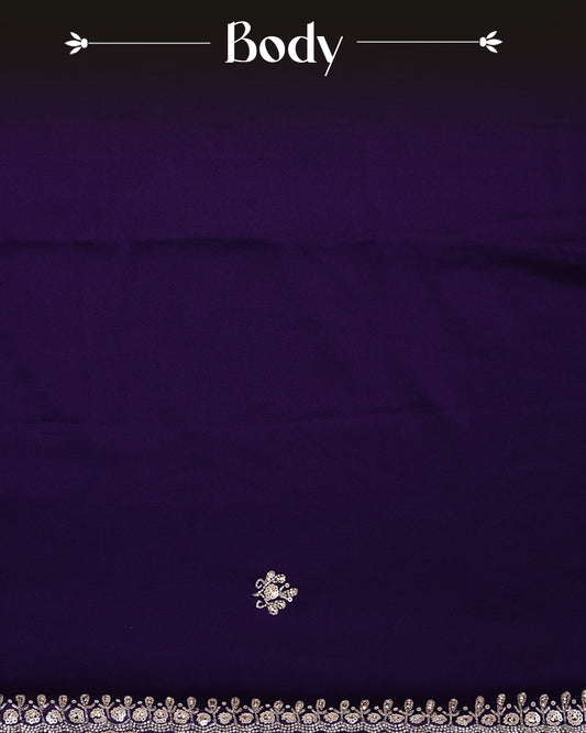 Purple colour Chiffon Designer saree featuring Beats & Sequins Motifs on body and worked border, comes with matching blouse piece.