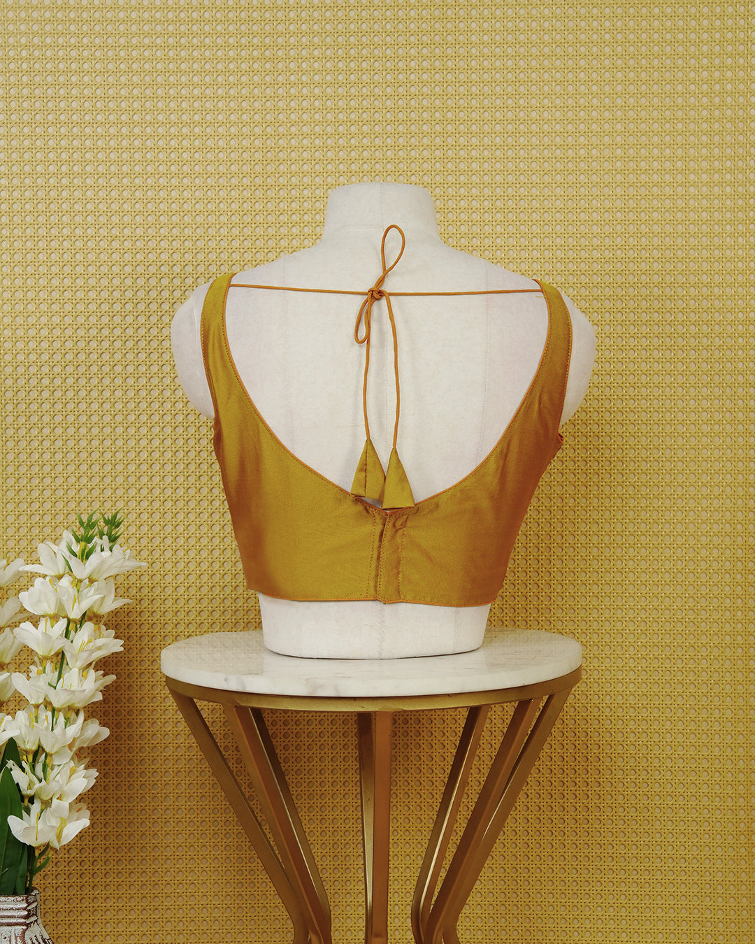 Mustard Colour Sleeveless Blouse Featuring A Classic Boat Neck, Smooth Finish, And A Comfortable Tailored Fit.