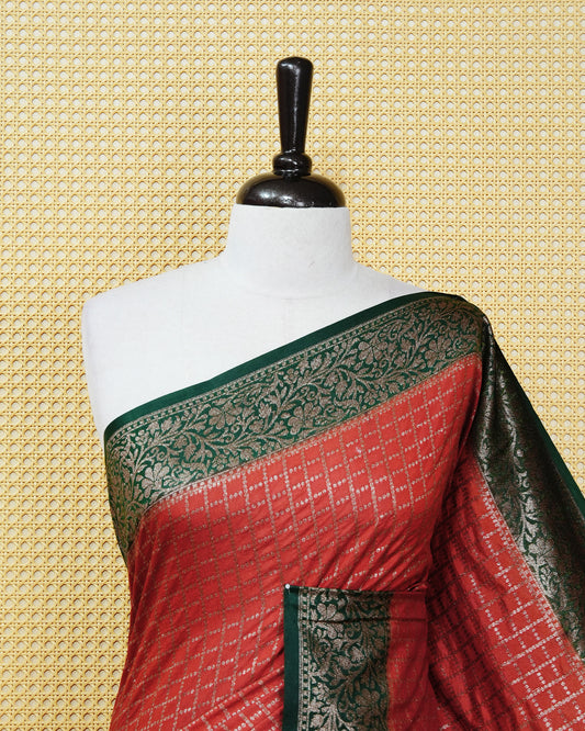 Brick brown Colour Semi georgette Saree having zari dotted check pattern on body, contrast dark forest green colour floral kodi designed Border, Rich Pallu comes with Matching Blouse piece.