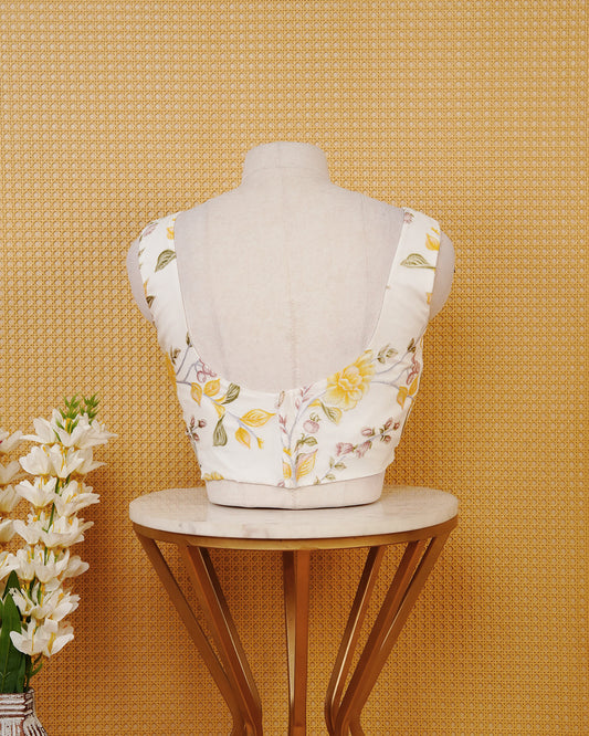 White Floral Print Sleeveless Blouse Featuring A Classic Scoop Neck, Delicate Yellow Floral Print, And A Comfortable Tailored Fit.