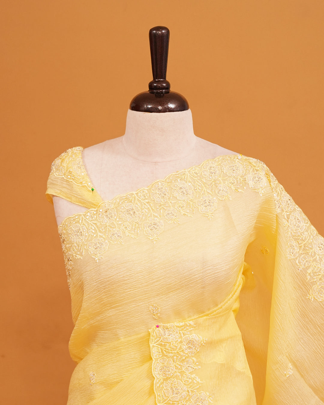 Pastel Yellow colour Crush organza saree with Cut Beats & Sequins.