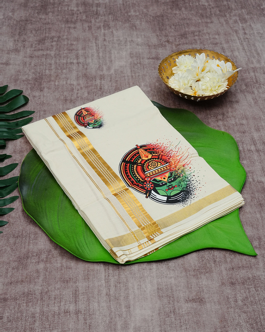 Cream Coloured Cotton Double Dhoti Finished with Kathakali Prints & Gold Kara