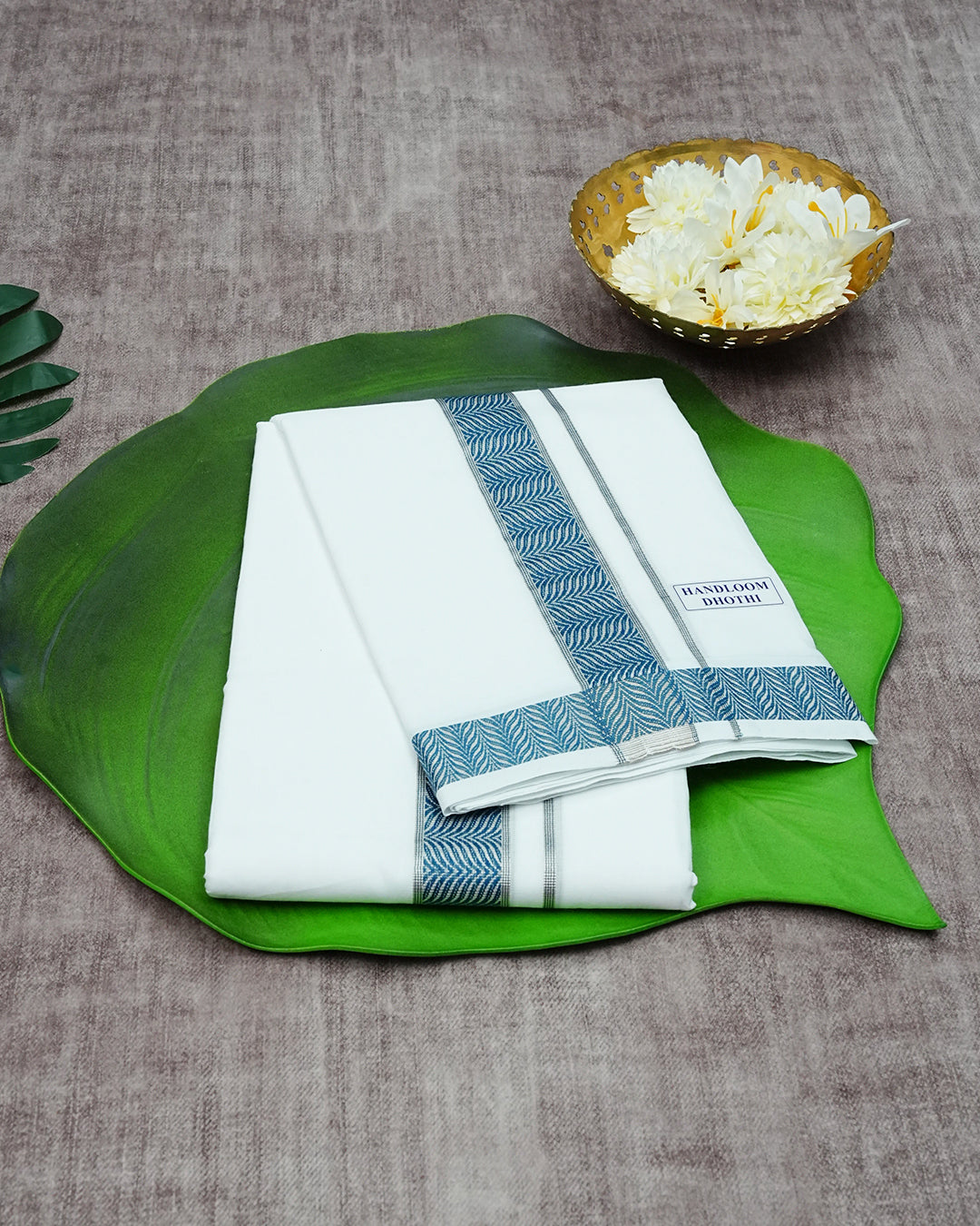 Off White Colour Pure Cotton Double Dhoti Finished With A Blue Designed Pattern On Silver kara.