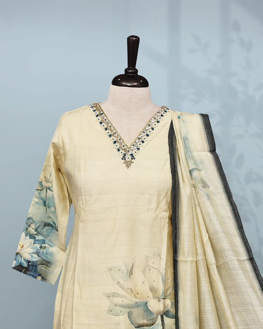 Cream colour Salwar set comes top with beats Work on neck line and Digital print on body, paired with matching bottom and dupatta.