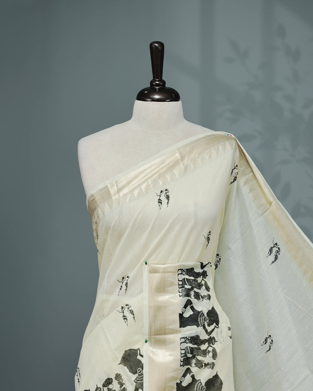 Cream colour Semi chanderi kerala saree featuring Black colour Print on body, complemented by Light Gold zari Border, paired with matching blouse piece.