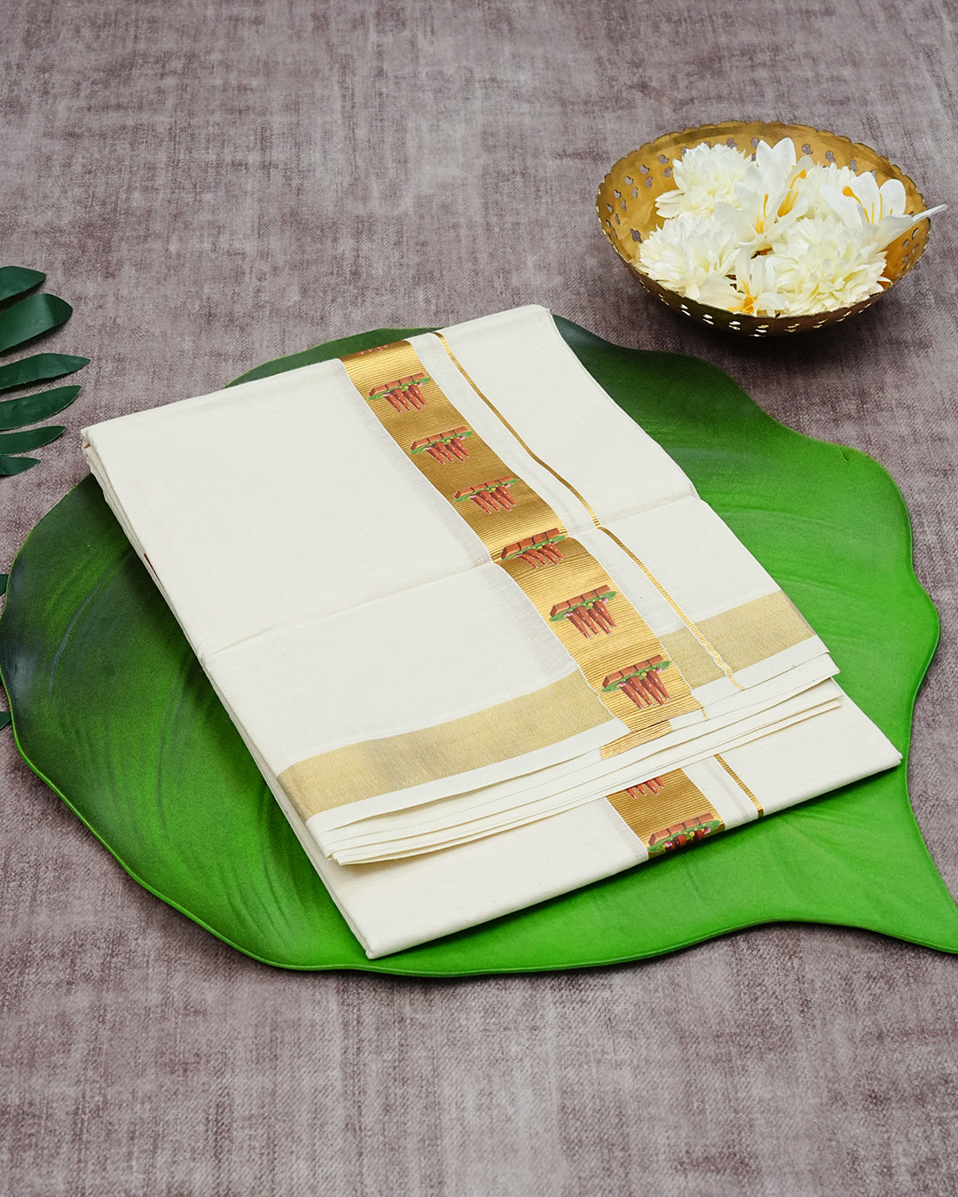 Cream Coloured Cotton Double Dhoti Finished with Onam Themed Printed Gold Kara