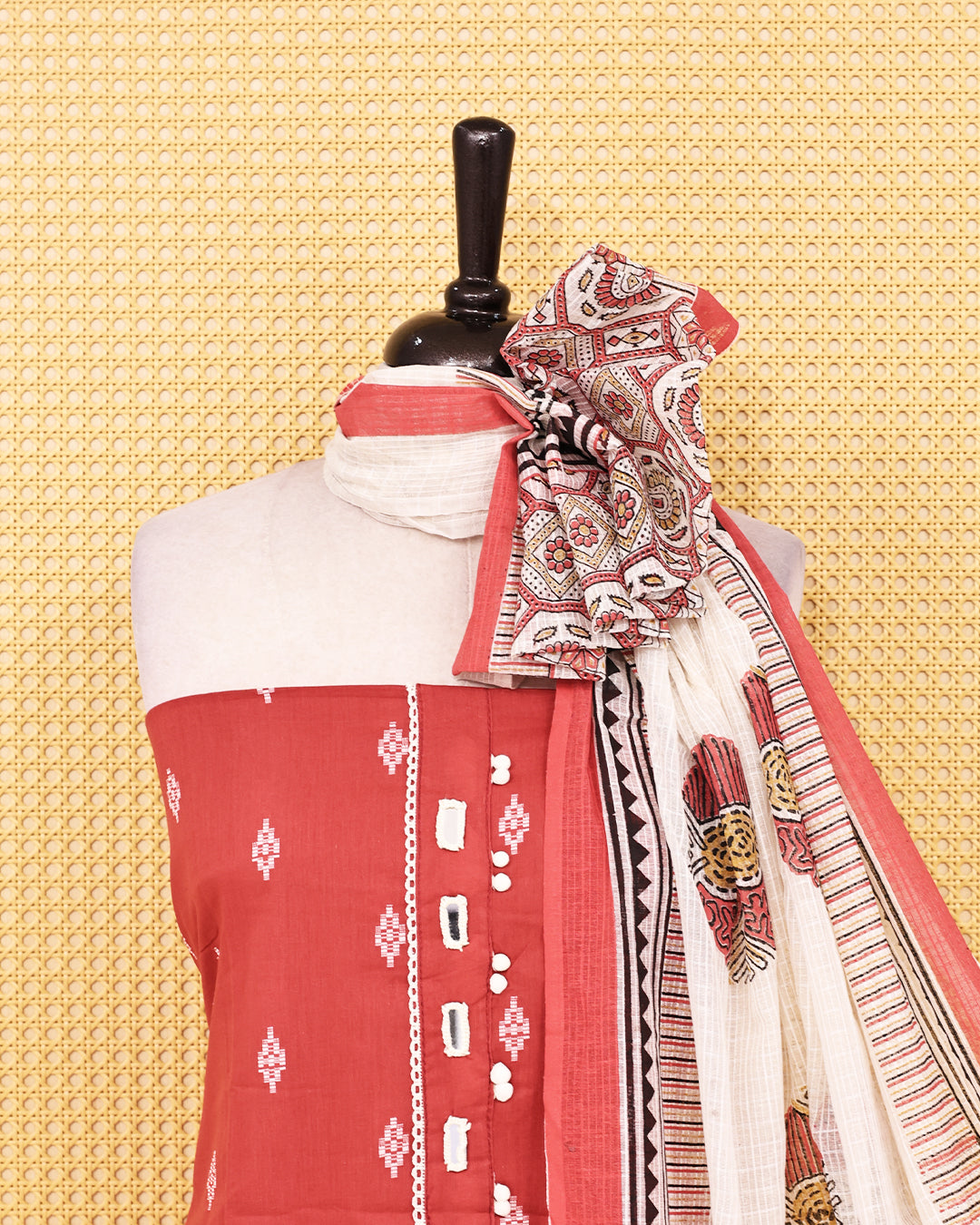 Brick red colour Cotton salwar material featuring Thread with mirror work on body, paired with matching bottom & dupatta.