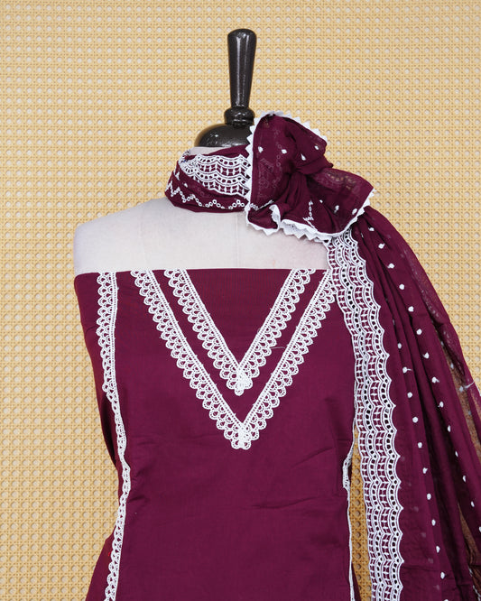 Deep Wine colour Cotton Salwar Material Featuring an Threadwork on Body, lace work on neck portion, Paired With a Matching Bottom and an Elegant Dupatta.