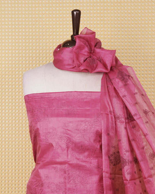 Dusty pink colour Tussar Salwar material featuring Threadwork on the body, paired with a matching bottom and an elegant dupatta.