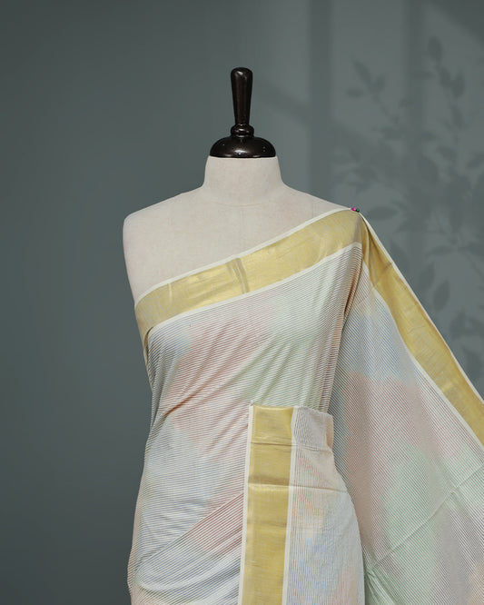 Cream colour Cotton kerala saree featuring Multicolour Strips on body, complemented by Gold zari & multi colour Border, paired with matching blouse piece.