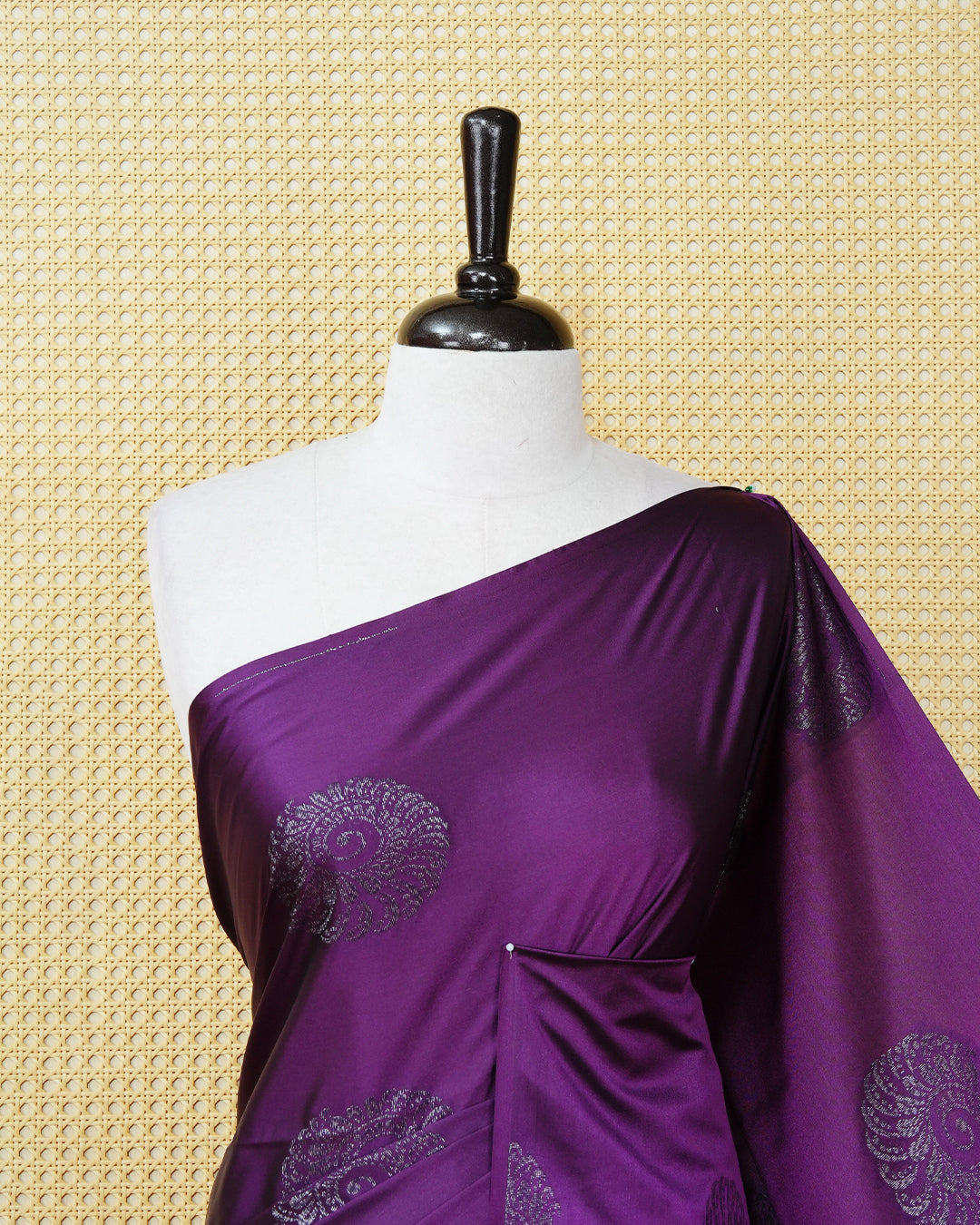 Deep purple colour soft silk saree featuring antique zari motifs on body with contrast self colour pallu & paired with matching blouse piece.