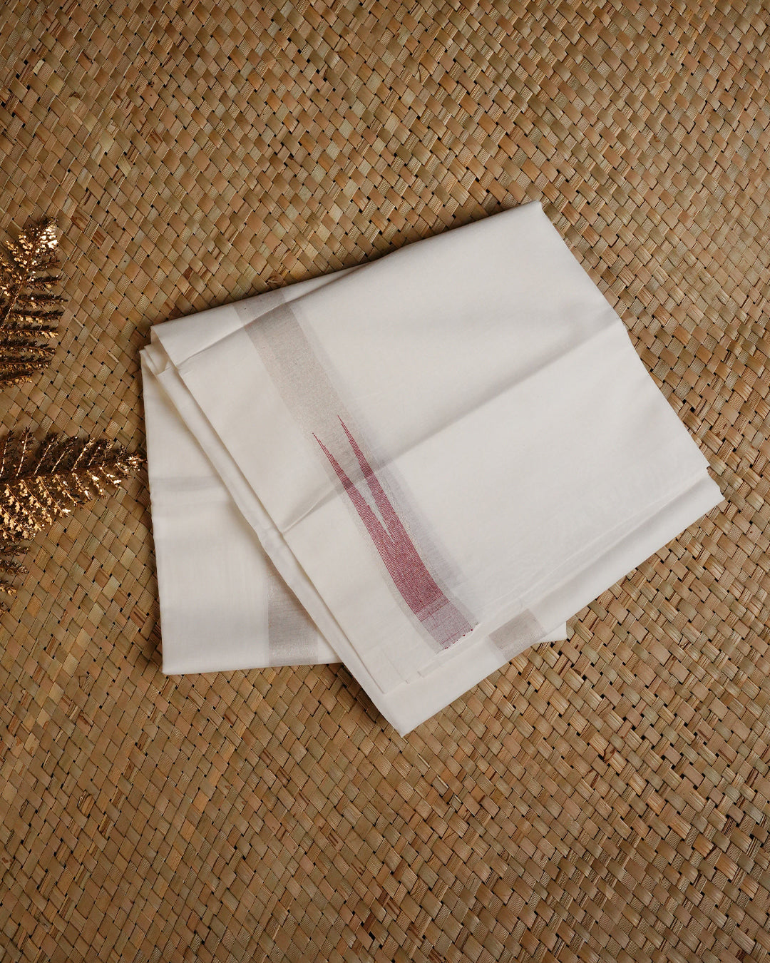 White colour cotton single dhoti featuring Light Gold with Maroon colour border.
