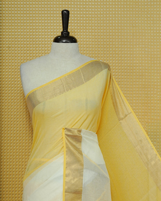 Yellow & White Colour Half & Half Mul cotton saree Complemented by contrast Green colour Border & tassels.