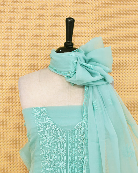 Pastel green colour Crush organza salwar material featuring thread work on body, paired with Matching bottom & dupatta.