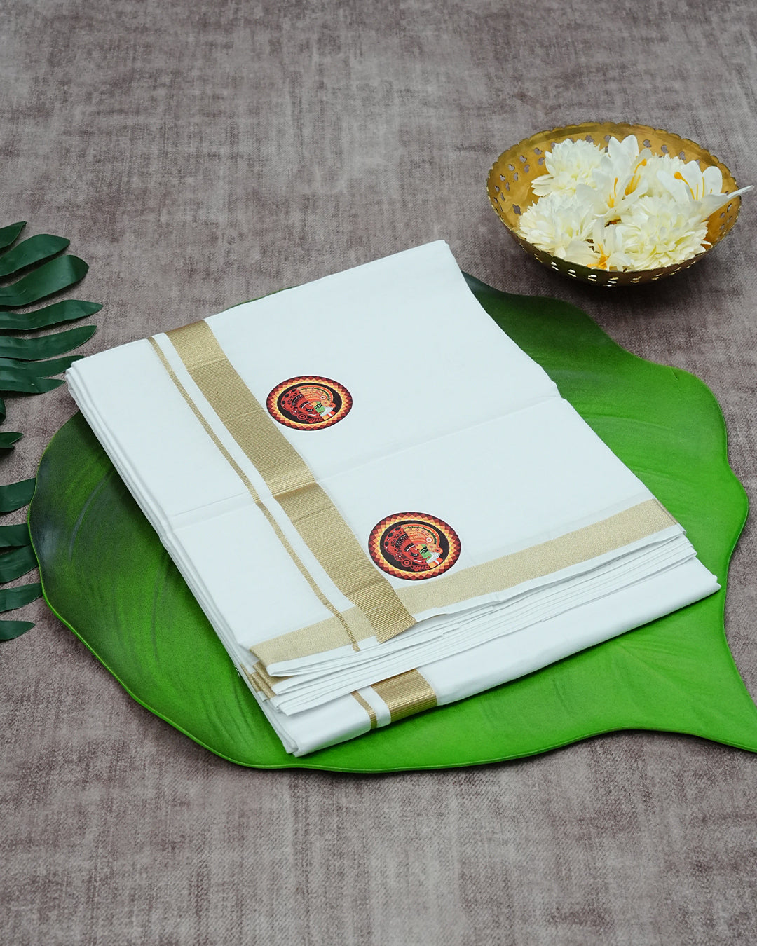 Cream-Coloured Cotton Double Dhoti Finished with Theyyam, Kathakali Prints & Gold Kara