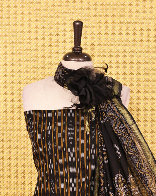 Black colour Cotton Salwar material Designed strips on body, paired with matching bottom & Dupatta.