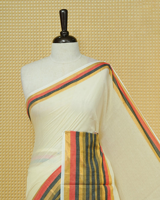 Cream colour Mul cotton saree featuring Elegant Plain body, complemented by contrast Red, Black & gold zari border & Tassels.