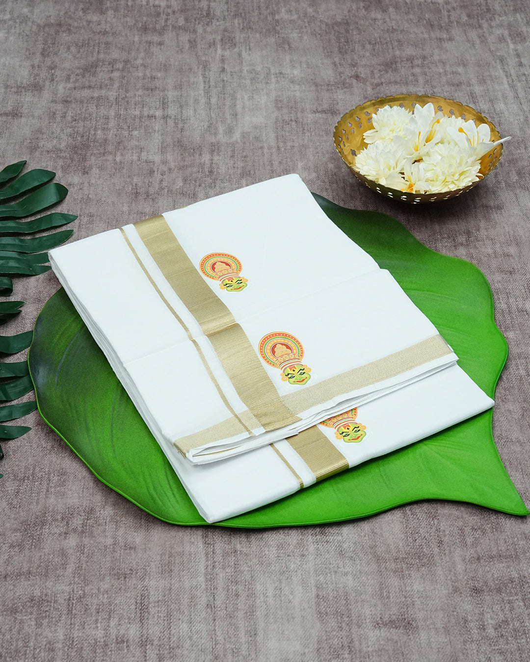 Off White Coloured Cotton Double Dhoti Finished with Traditional Art Form Prints & Gold Kara