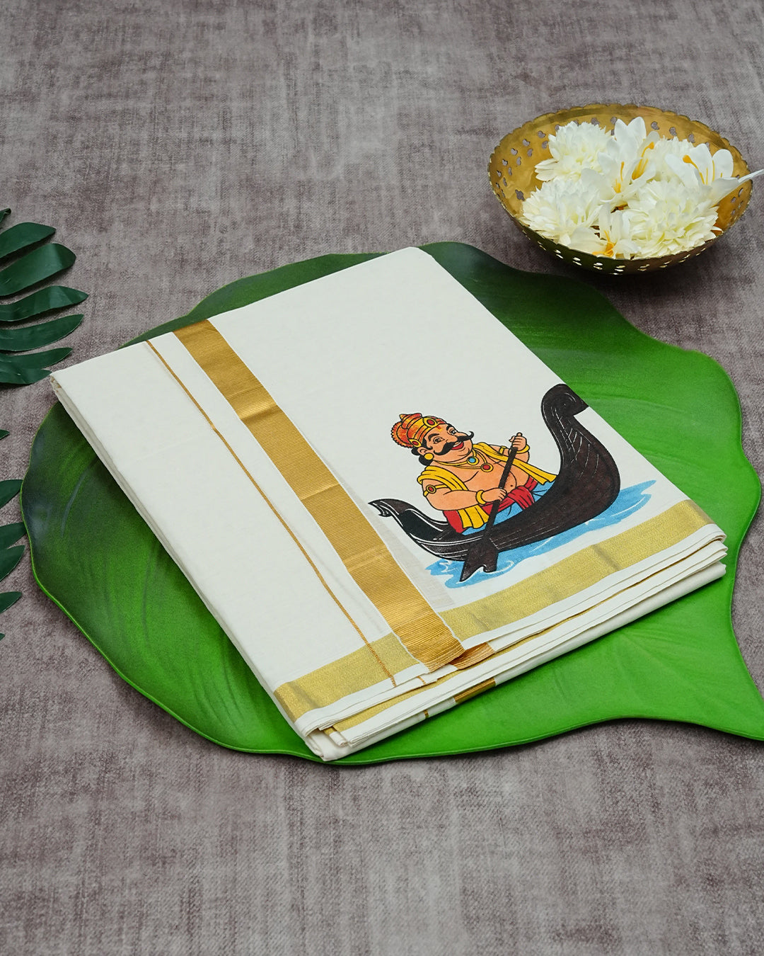 Cream Coloured Cotton Double Dhoti Finished with Onam Themed Prints & Gold Kara