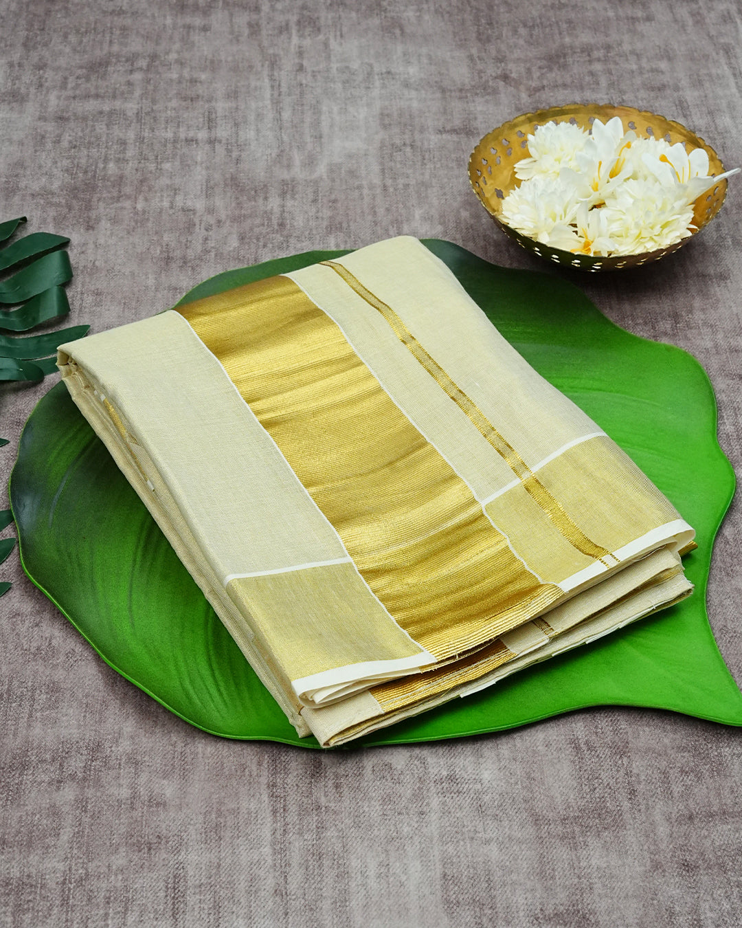Gold colour tissue double dhoti featuring Elegant Gold kasavu zari border