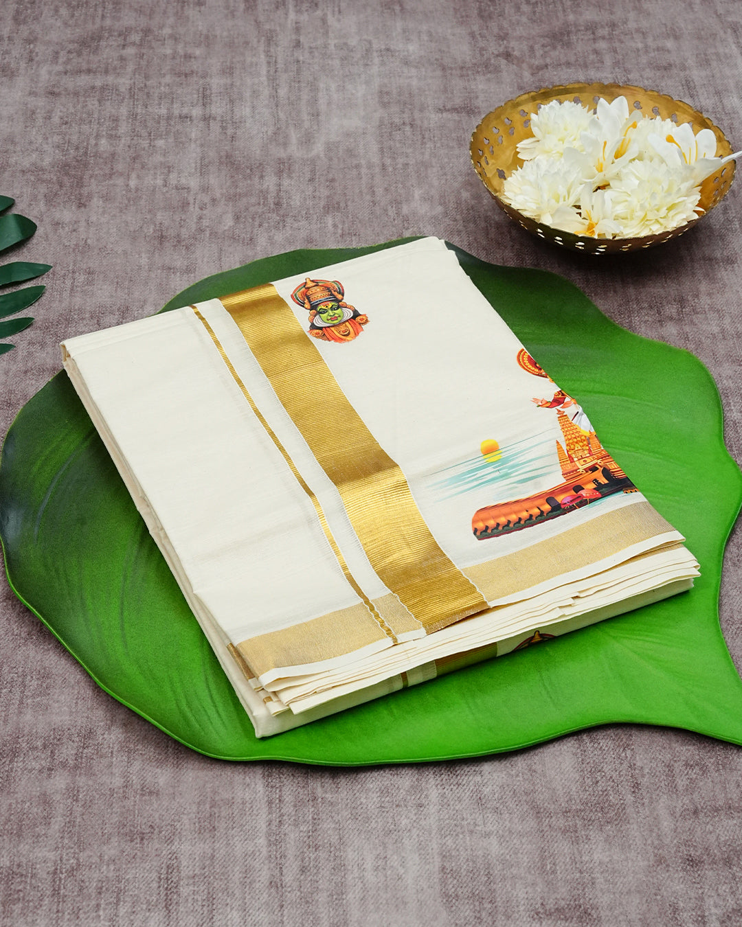 Cream Coloured Cotton Double Dhoti Finished with Traditional Art Form Prints & Gold Kara