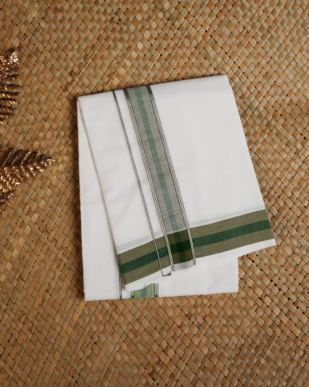 White colour RAMRAJ cotton single dhoti featuring Light Gold with green colour  border.