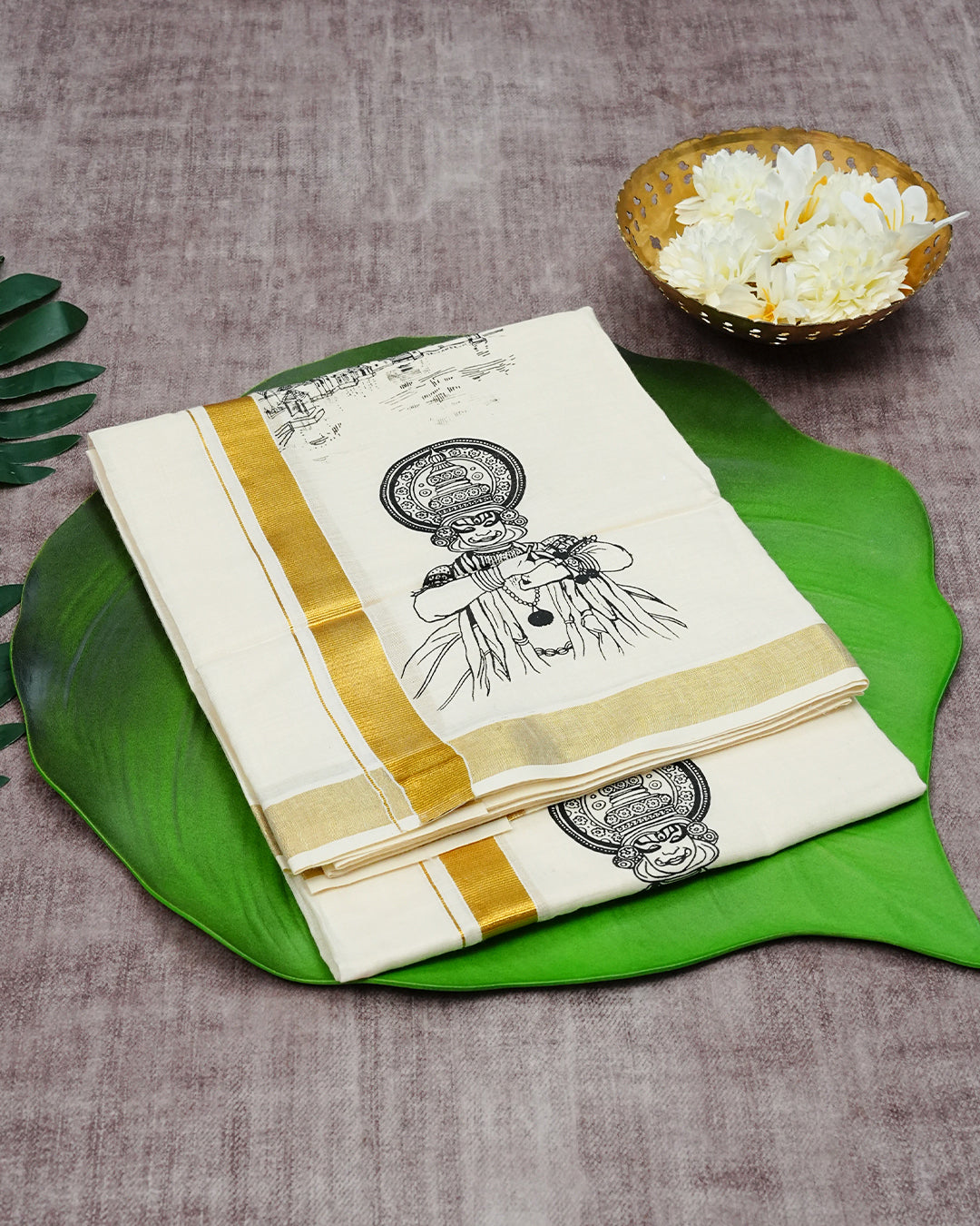 Cream Coloured Cotton Double Dhoti Finished with Traditional Kerala Cultural Prints & Gold Kara