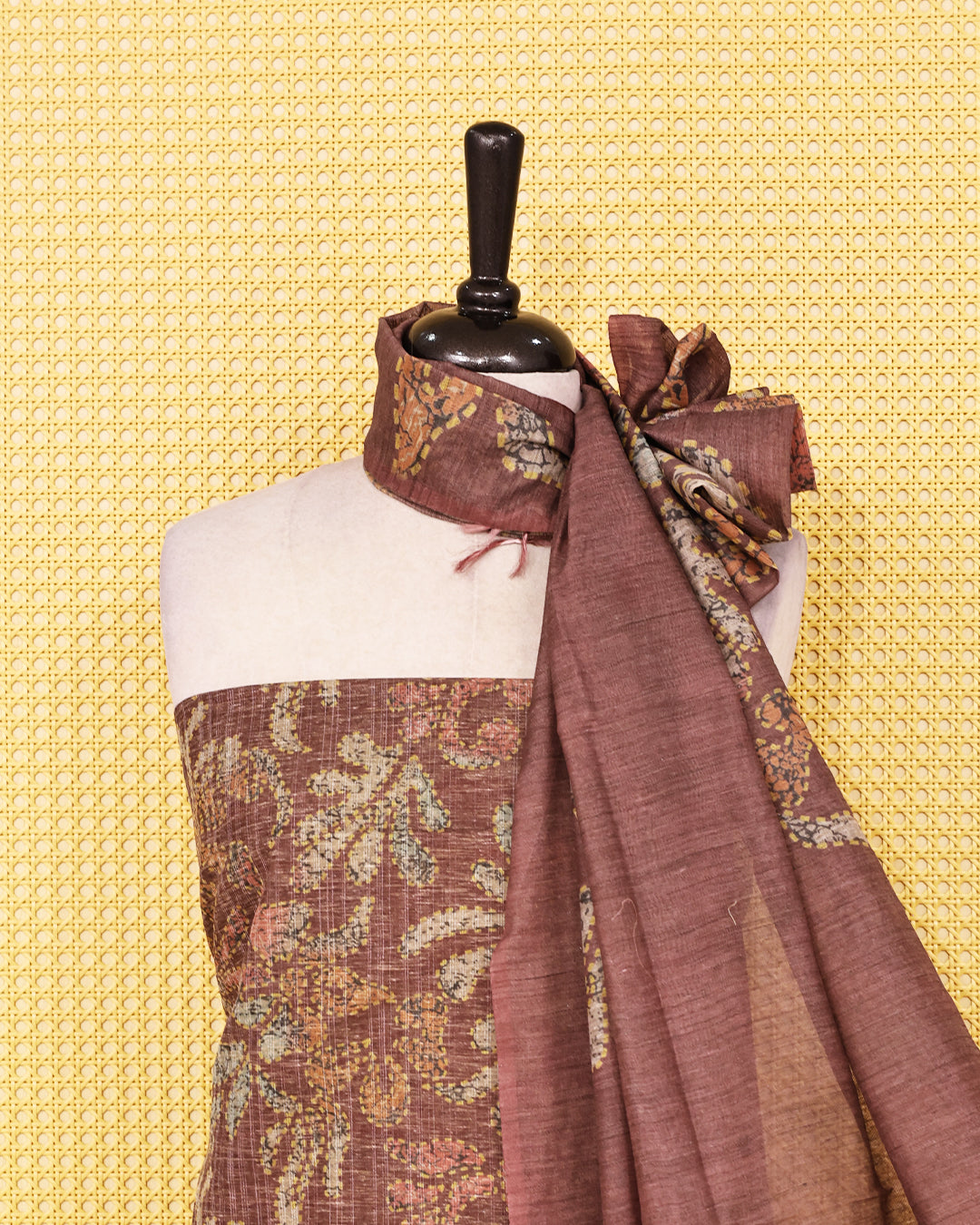 Brown colour organza Salwar Material featuring elegant floral prints on the kurta, paired with a matching bottom and a self coloured printed dupatta.
