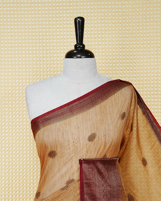 Sandal colour semi linen saree thread motifs on body, contrast maroon colour gold zari border, rich pallu comes with matching blouse piece