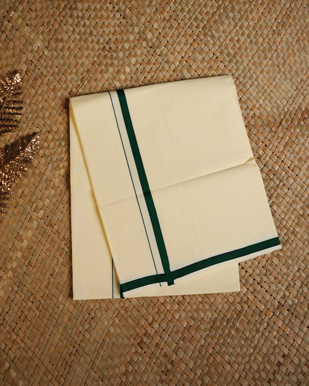 Cream colour cotton Single dhoti featuring Green simple border.