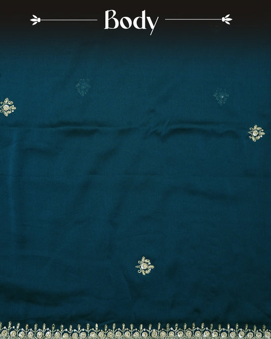 Teal colour Chiffon Designer saree featuring Beats & Sequins Motifs on body and worked border, comes with matching blouse piece.