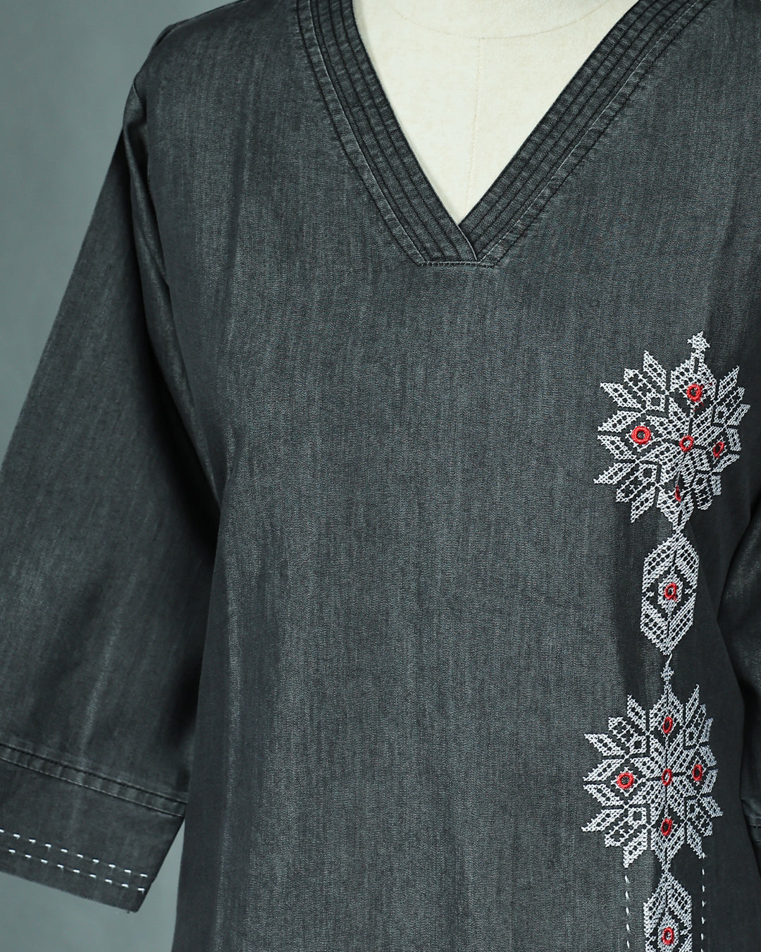 Black Denim Colour Kurti featuring Thread Work On body , a V neckline, With sleeve.